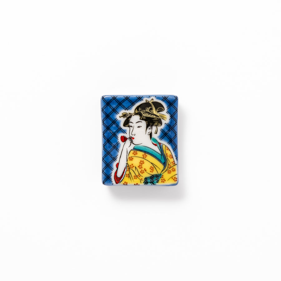 Rectangular Japanese ceramic chopstick rest featuring an elegant courtesan in traditional kimono, inspired by Utamaro’s ukiyo-e artistry, perfect for table decor.