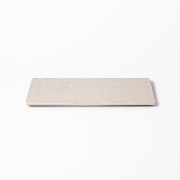 Textured white ceramic dinner plate with a subtle woodgrain pattern, ideal for elegant Japanese table settings and modern minimalist dining.