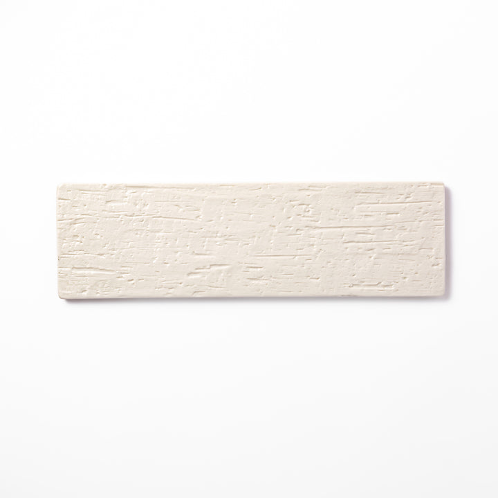 Textured rectangular white ceramic serving plate with a woodgrain-like pattern, perfect for minimalist Japanese table settings or modern kitchens.