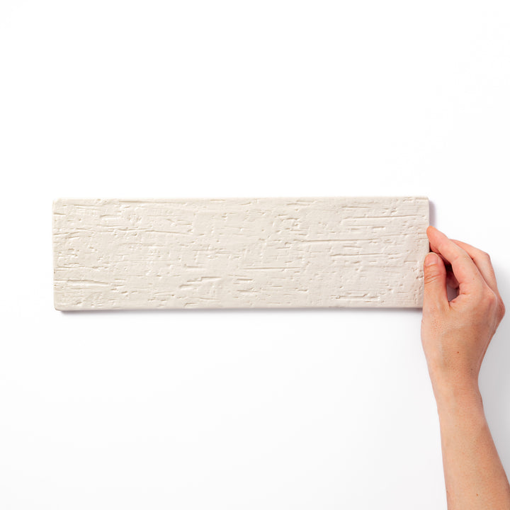 Textured rectangular white ceramic serving plate with a woodgrain-like pattern, perfect for minimalist Japanese table settings or modern kitchens.
