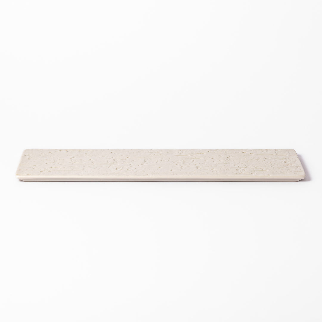 Textured rectangular white ceramic serving plate with a woodgrain-like pattern, perfect for minimalist Japanese table settings or modern kitchens.