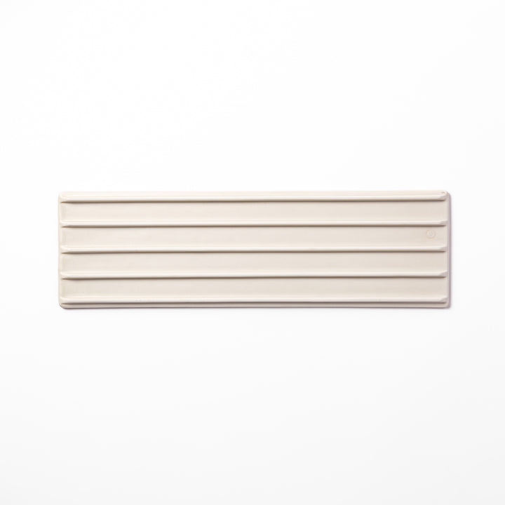 Textured rectangular white ceramic serving plate with a woodgrain-like pattern, perfect for minimalist Japanese table settings or modern kitchens.