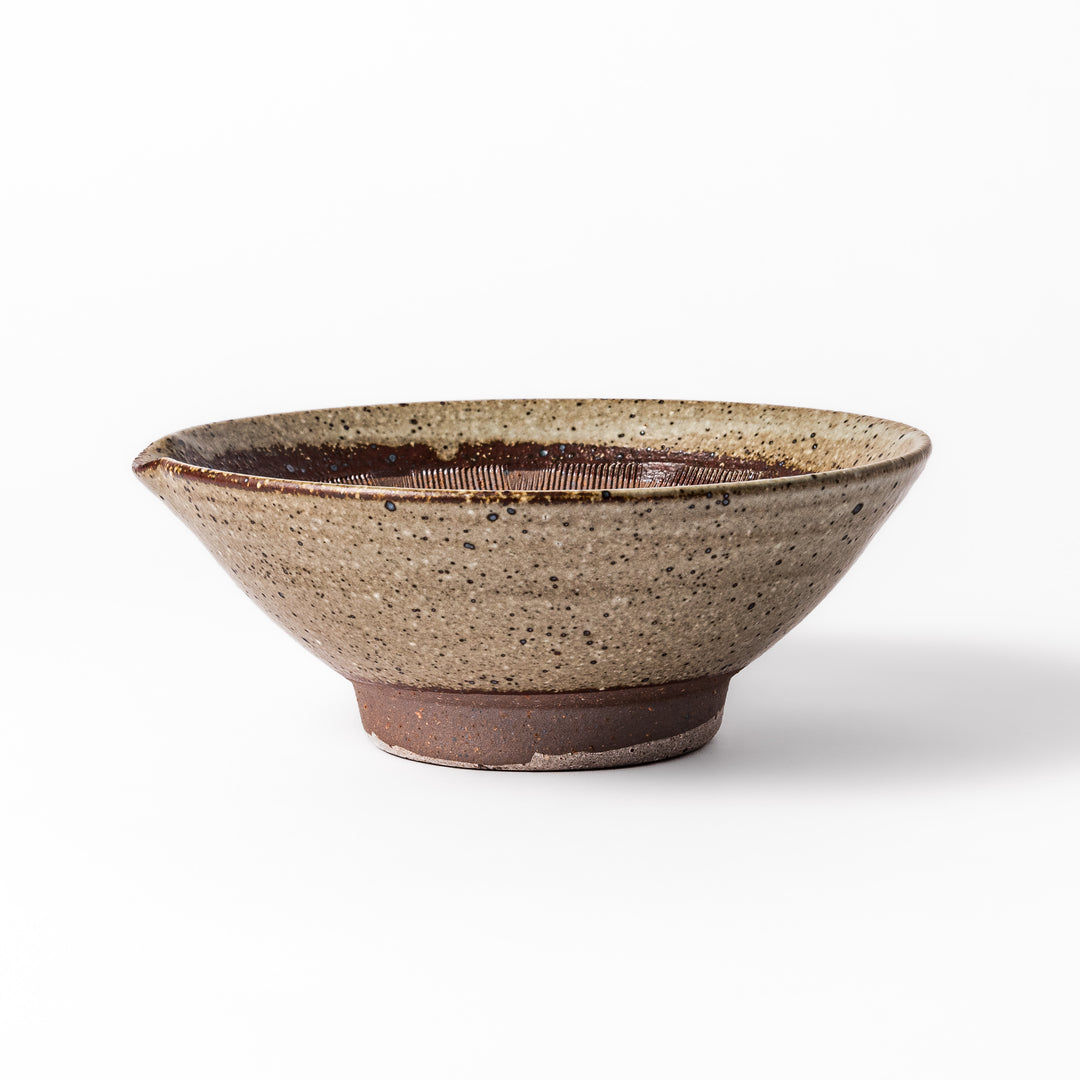 Speckled white Karatsu-style mortar with a deep brown interior and textured ridges, ideal for traditional sesame grinding.