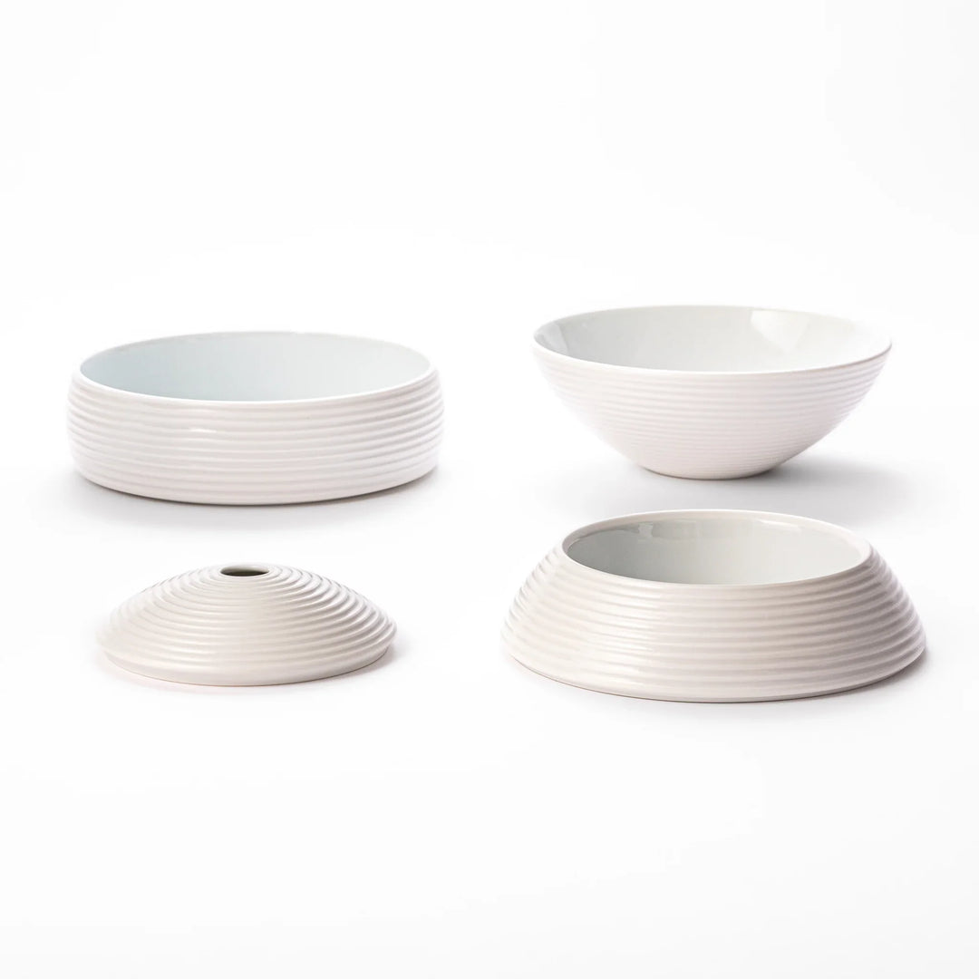 White porcelain moon shaped jubako box with textured ridged surface