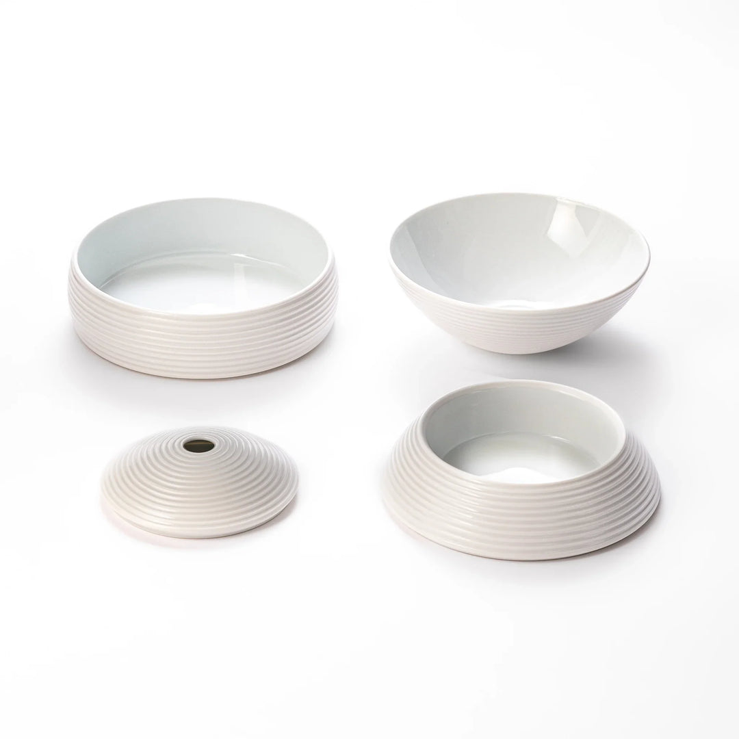 White porcelain moon shaped jubako box with textured ridged surface
