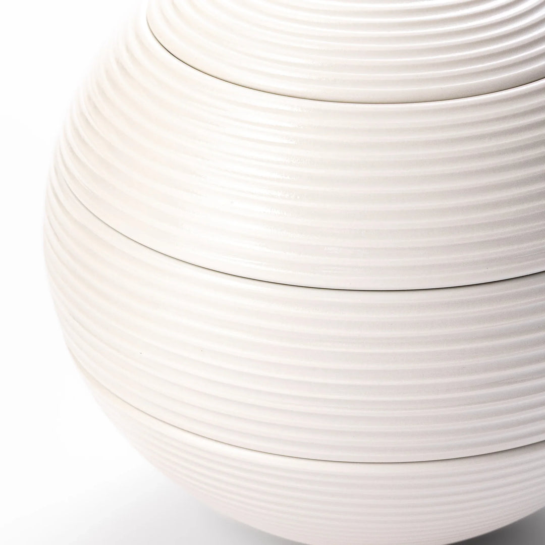 White porcelain moon shaped jubako box with textured ridged surface