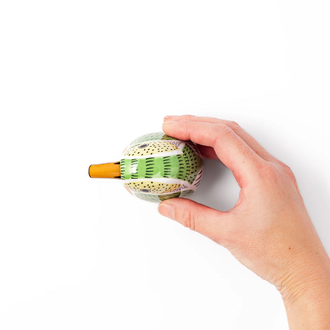 Bird-shaped soy sauce dispenser with green and yellow hand-painted details, adding a playful touch to your table.
