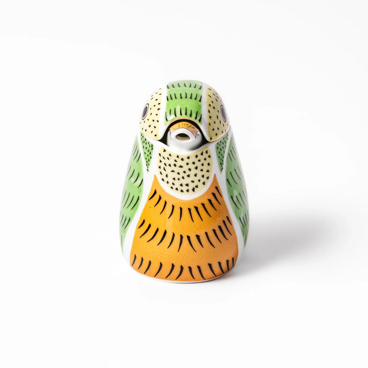 Bird-shaped soy sauce dispenser with green and yellow hand-painted details, adding a playful touch to your table.