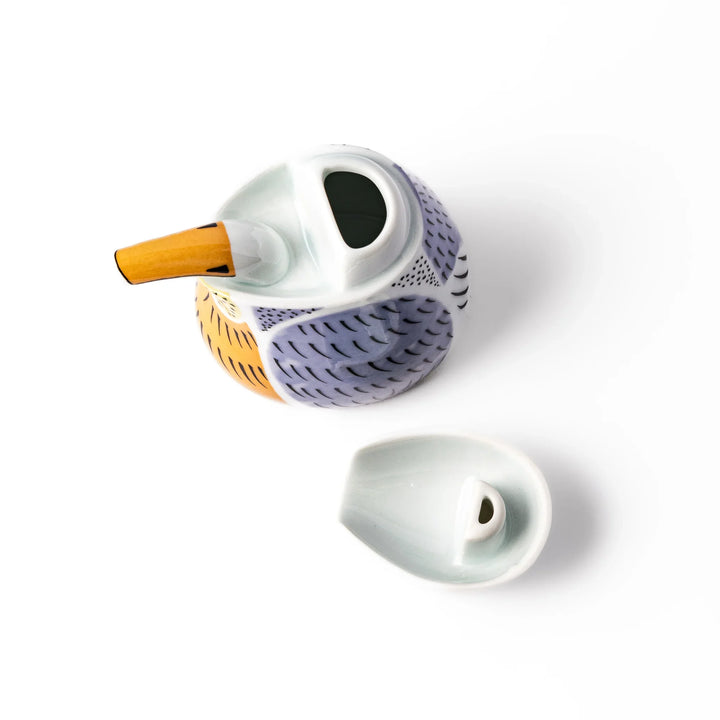 Bird-shaped soy sauce dispenser with purple and yellow hand-painted details, adding a playful touch to your table.