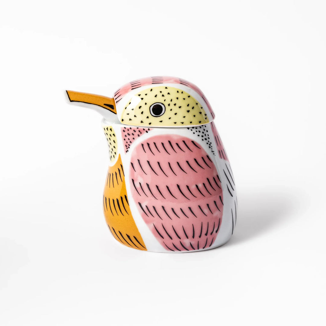 Bird-shaped soy sauce dispenser with pink and yellow hand-painted details, adding a playful touch to your table.
