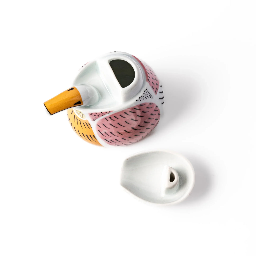 Bird-shaped soy sauce dispenser with pink and yellow hand-painted details, adding a playful touch to your table.