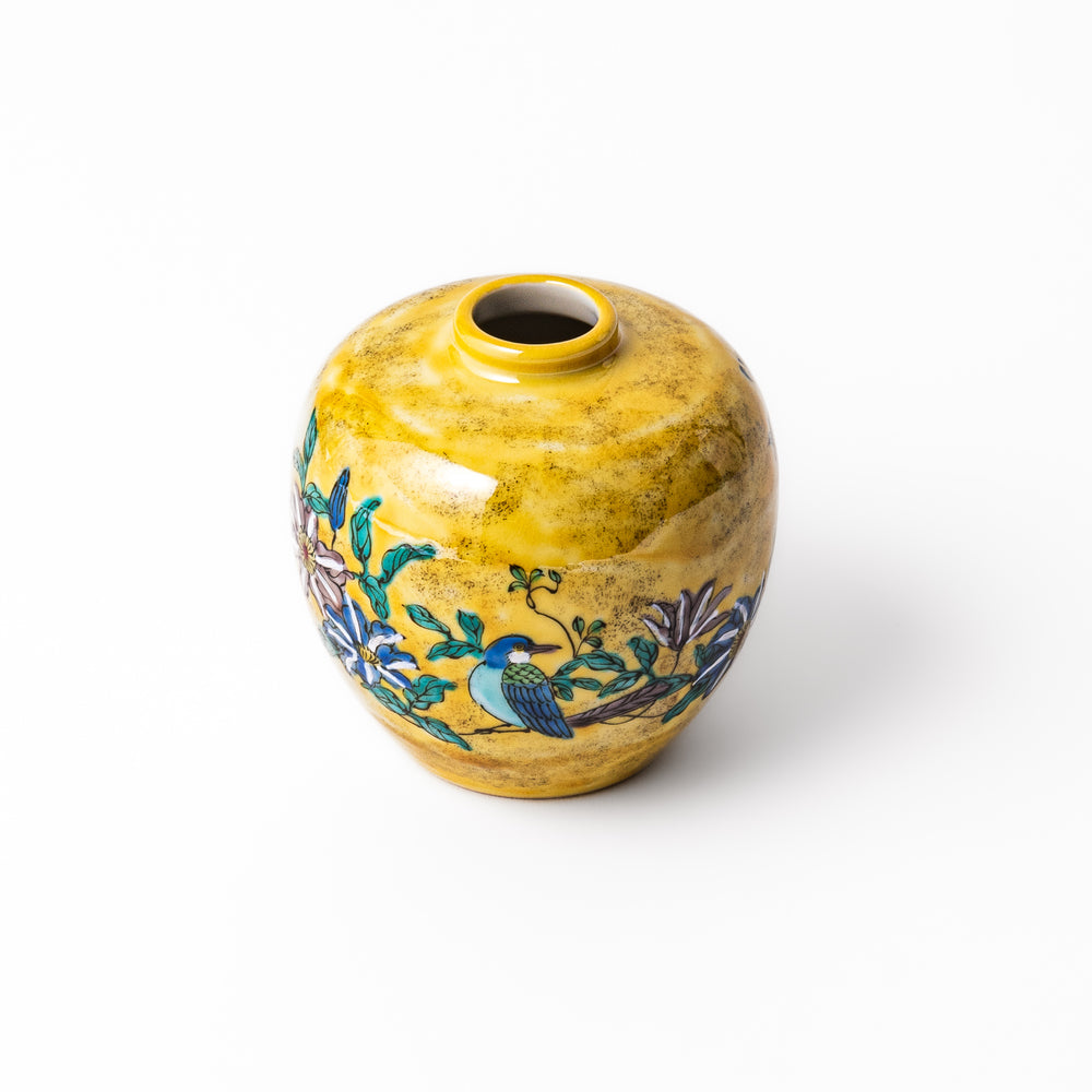 Japanese yellow porcelain bud vase with hand-painted camellia flowers and bird motif, handcrafted in Kutani ware for elegant floral display.