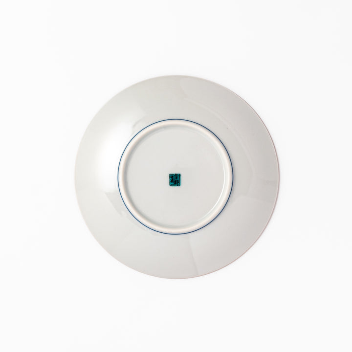 Japanese porcelain dessert plate with bold yellow peony blooms, green leaves, and brown branches on a white background