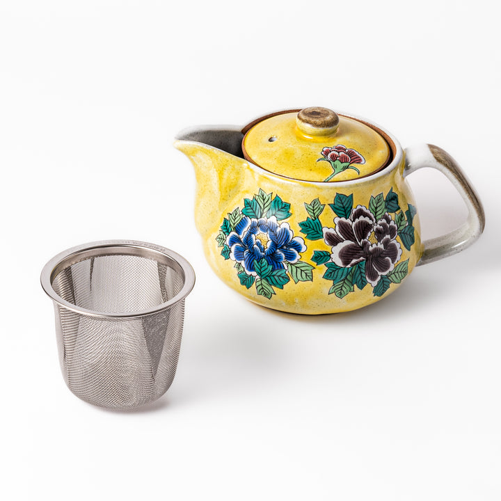 Ceramic teapot with a warm yellow glaze featuring hand-painted peony flowers in rich colors, paired with a removable stainless steel strainer.
