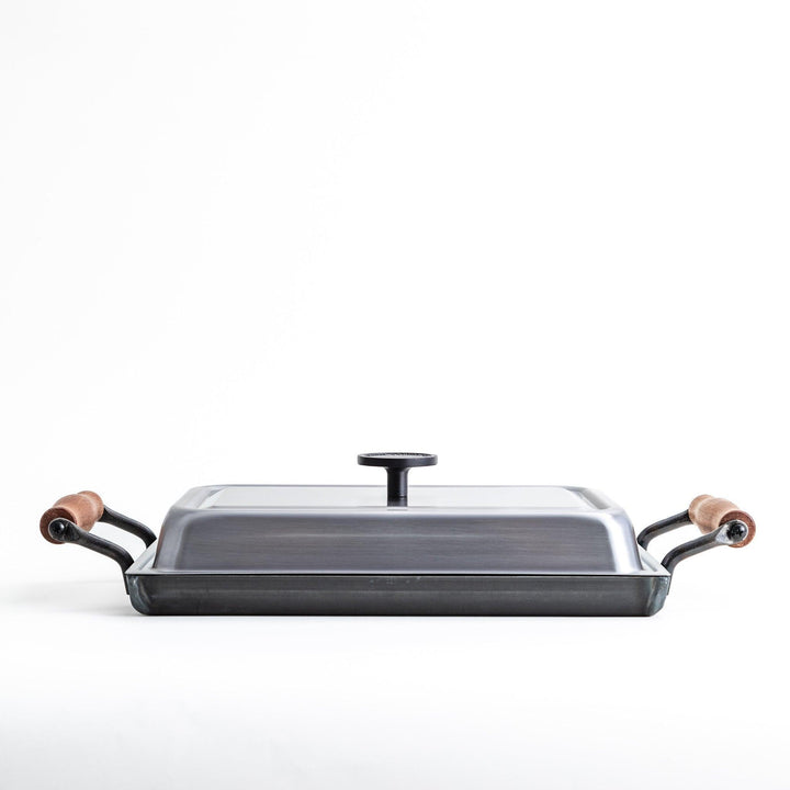 Rectangular teppanyaki grill pan with wooden handles on both sides with stainless steel lids