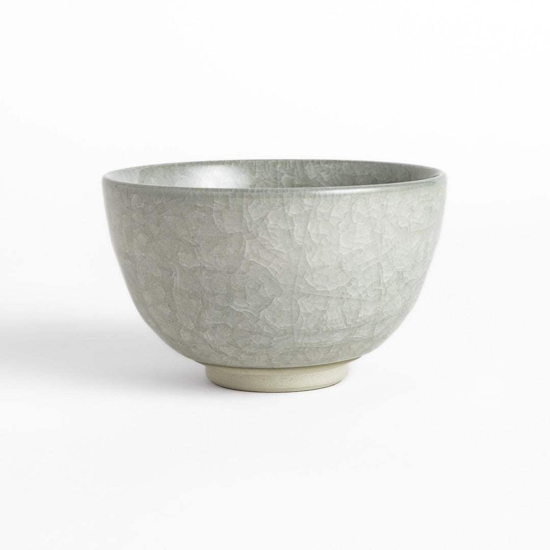 Azure clay matcha bowl with a smooth, cracked texture, perfect for enjoying matcha, offering a calming and elegant design for tea time.