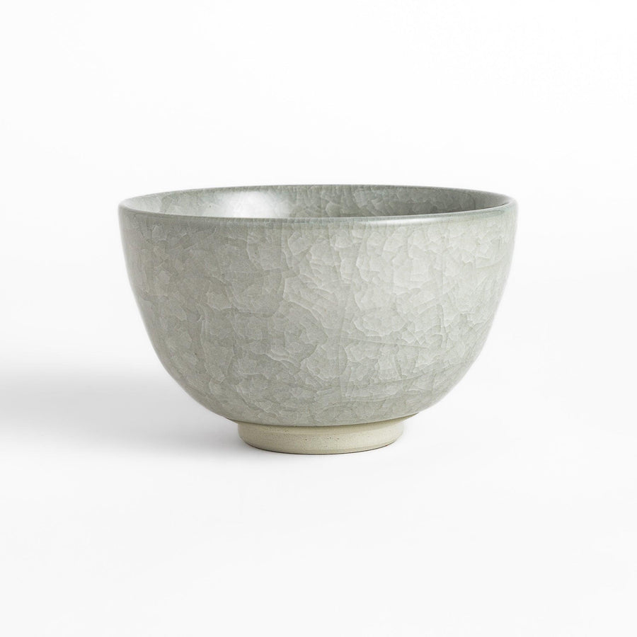 Azure clay matcha bowl with a smooth, cracked texture, perfect for enjoying matcha, offering a calming and elegant design for tea time.