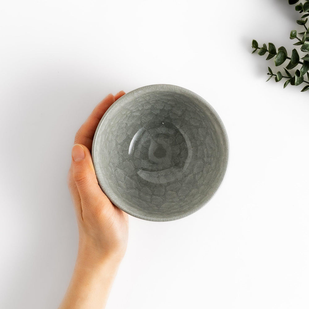 Azure clay matcha bowl with a smooth, cracked texture, perfect for enjoying matcha, offering a calming and elegant design for tea time.