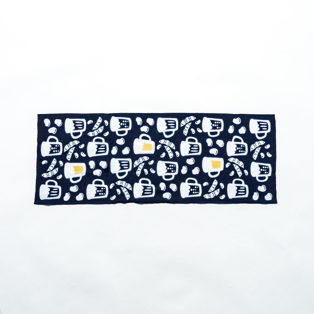 Fully extended dark navy tenugui showcasing beer mugs, soybeans, and edamame patterns in white and yellow.