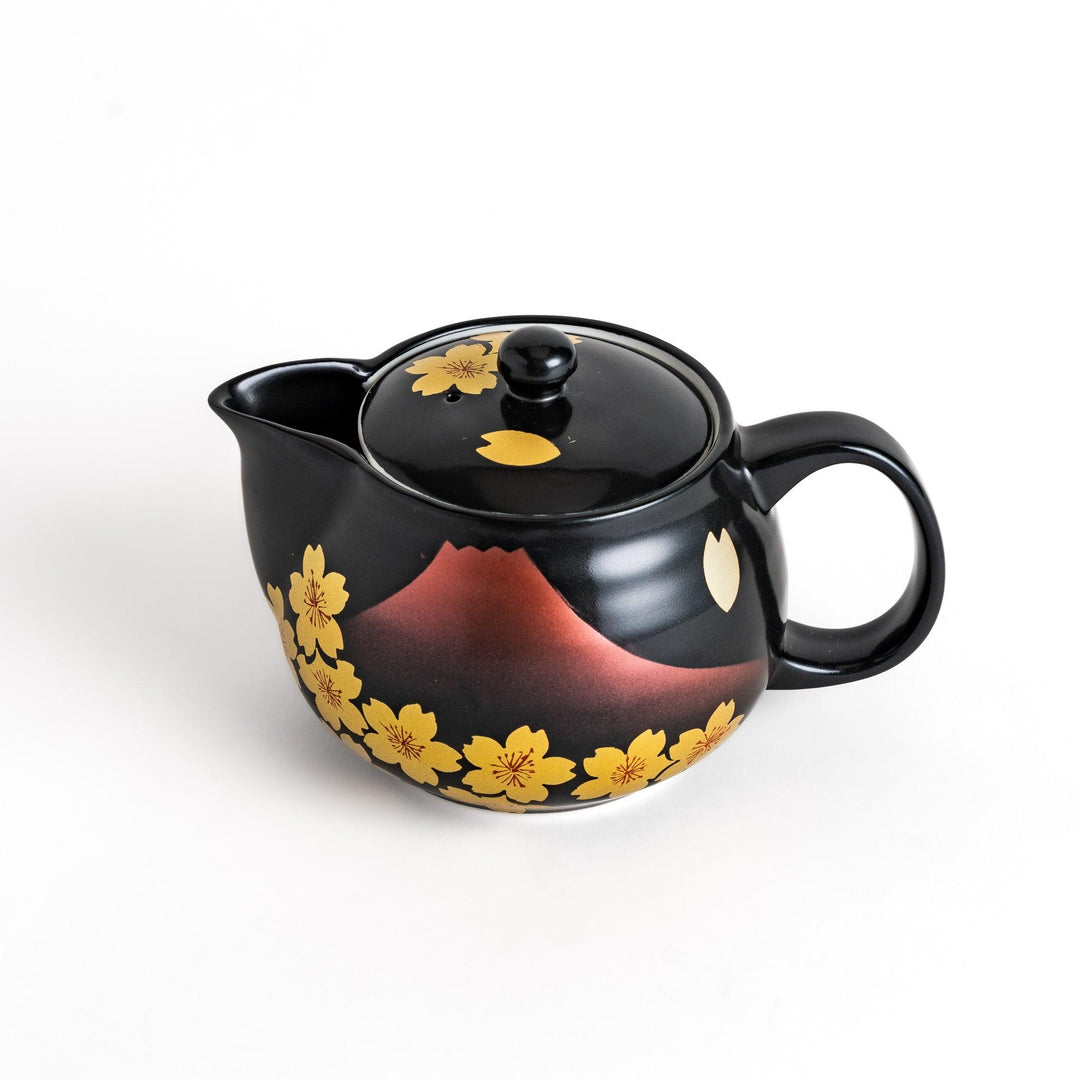 Black teapot with red Mount Fuji and yellow sakura designs, showcasing its elegant Japanese aesthetic and cultural charm.