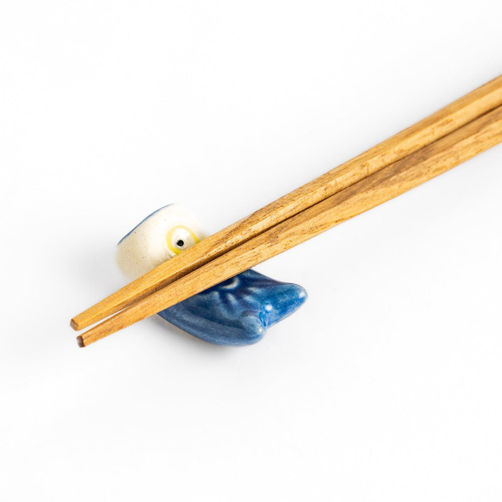 Ceramic chopstick rest shaped like a blue carp streamer, featuring hand-painted details and a charming traditional Japanese festive design.