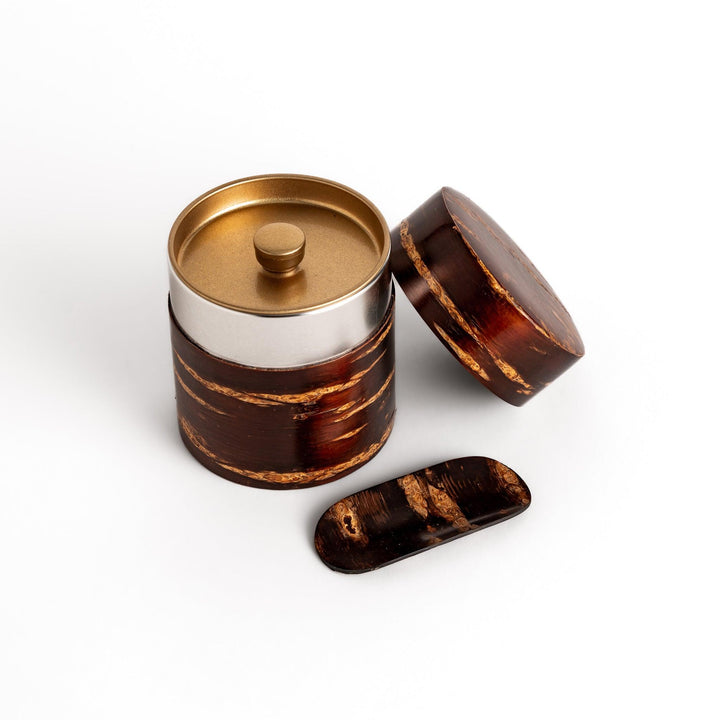 Cherry bark tea caddy and scoop set, showcasing the natural beauty of the bark and perfect for storing and serving your favorite loose leaf tea.