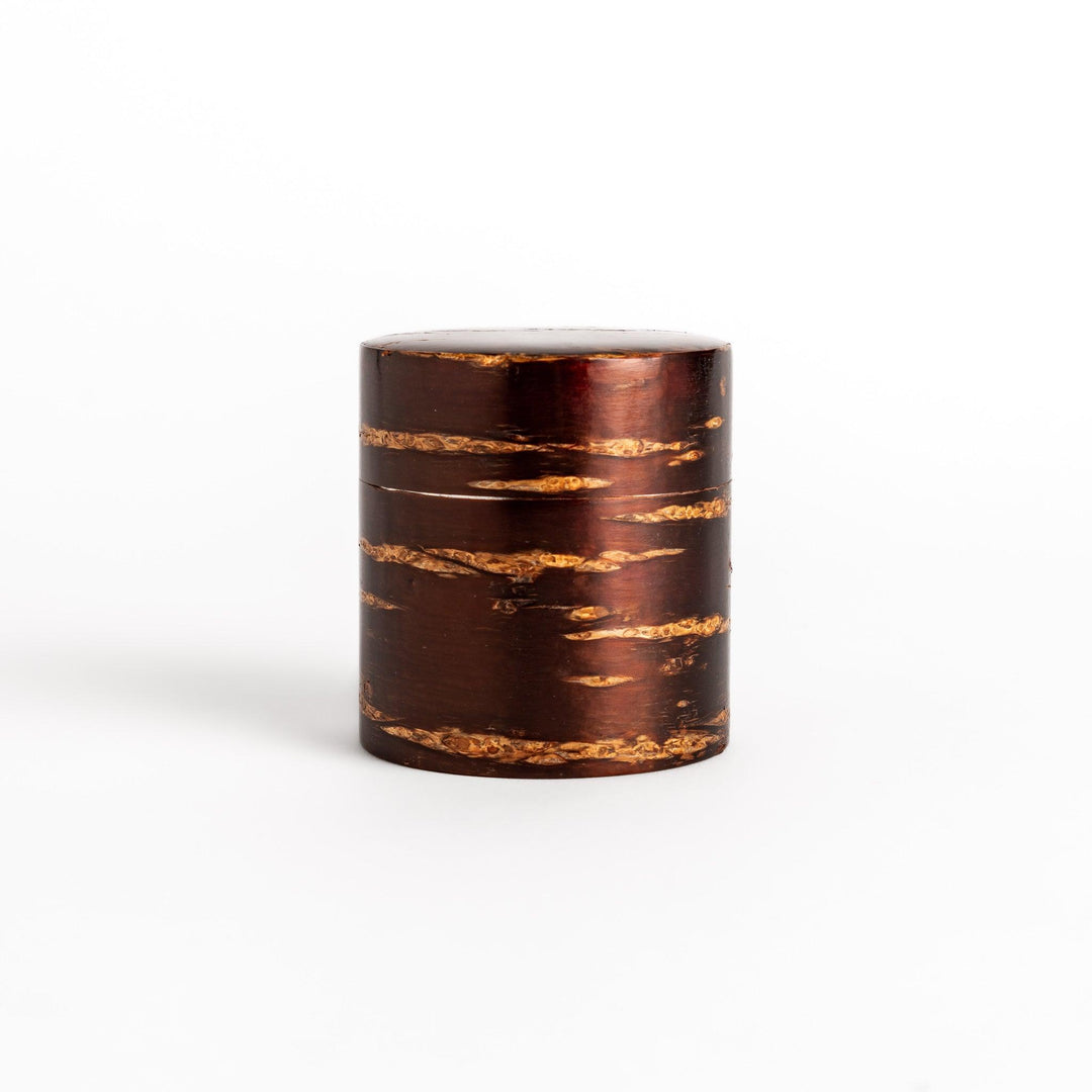 Cherry bark tea caddy and scoop set, showcasing the natural beauty of the bark and perfect for storing and serving your favorite loose leaf tea.