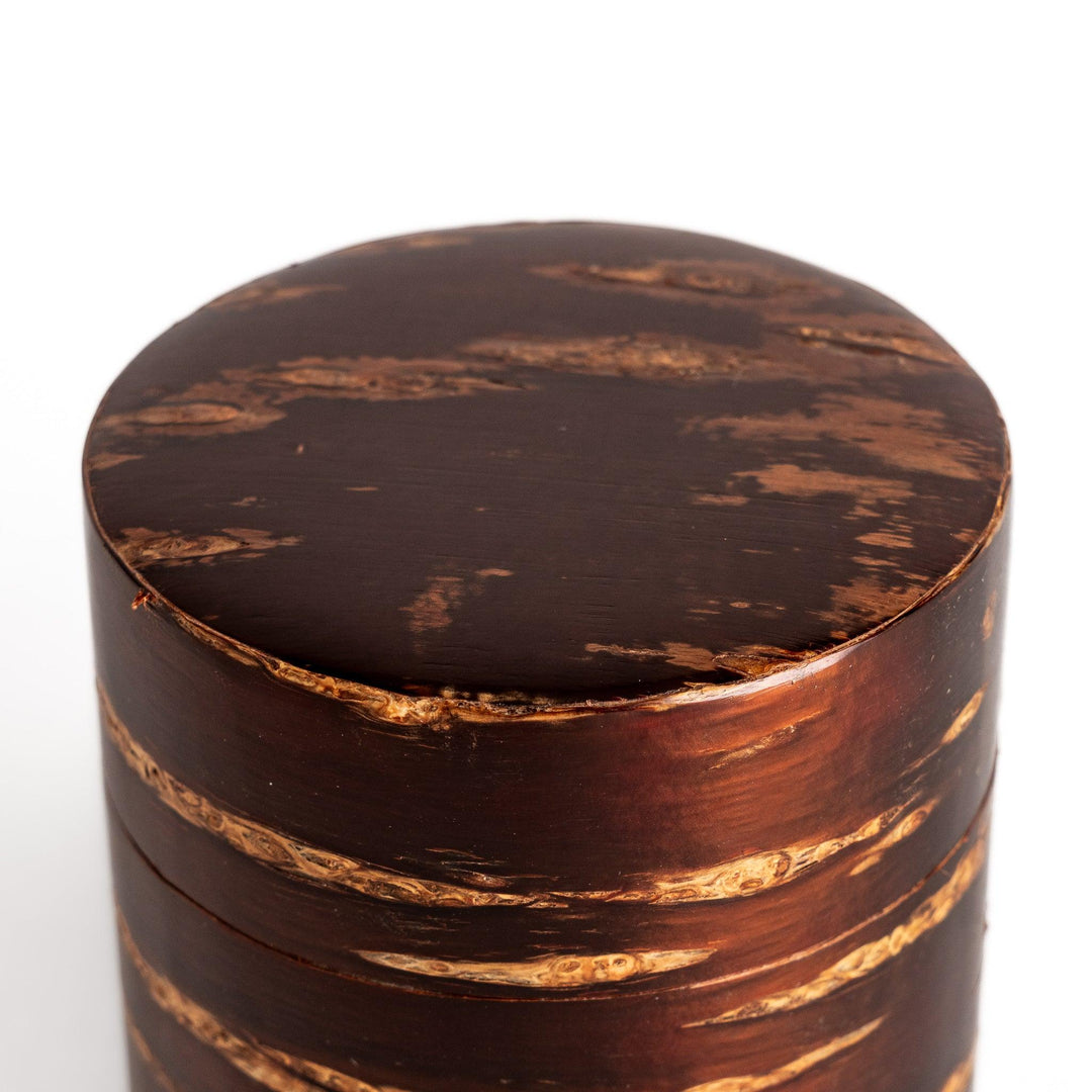 Cherry bark tea caddy and scoop set, showcasing the natural beauty of the bark and perfect for storing and serving your favorite loose leaf tea.