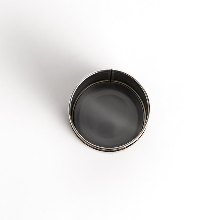 Classic cherry bark tea canister with a rich, dark brown finish and a natural wood grain, ideal for storing and preserving loose leaf tea.