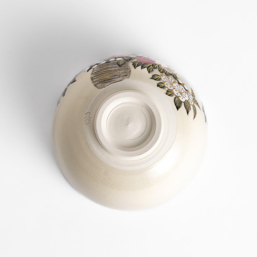 Beautiful Matcha Bowl adorned with delicate cherry blossom and tree motifs, accented with gold detailing for an elegant tea experience.
