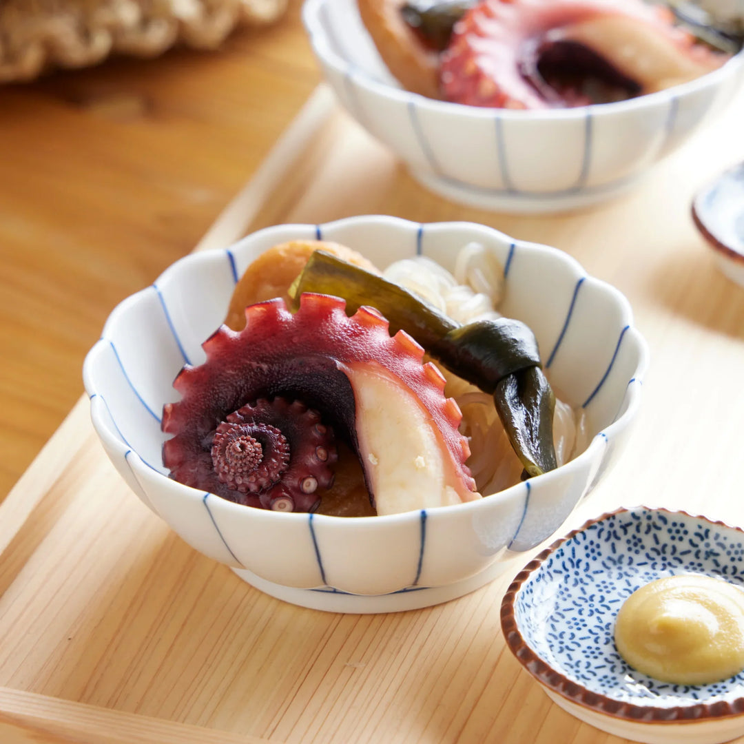 Chrysanthemum Wave Dessert Bowl serving Japanese oden with octopus, konbu, and noodles, elegant porcelain perfect for warm meals.