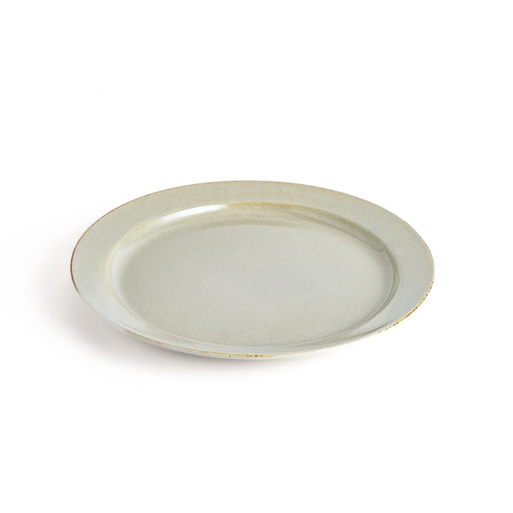 White ceramic dinner plate with a glossy finish, offering a clean and timeless design perfect for various table settings.