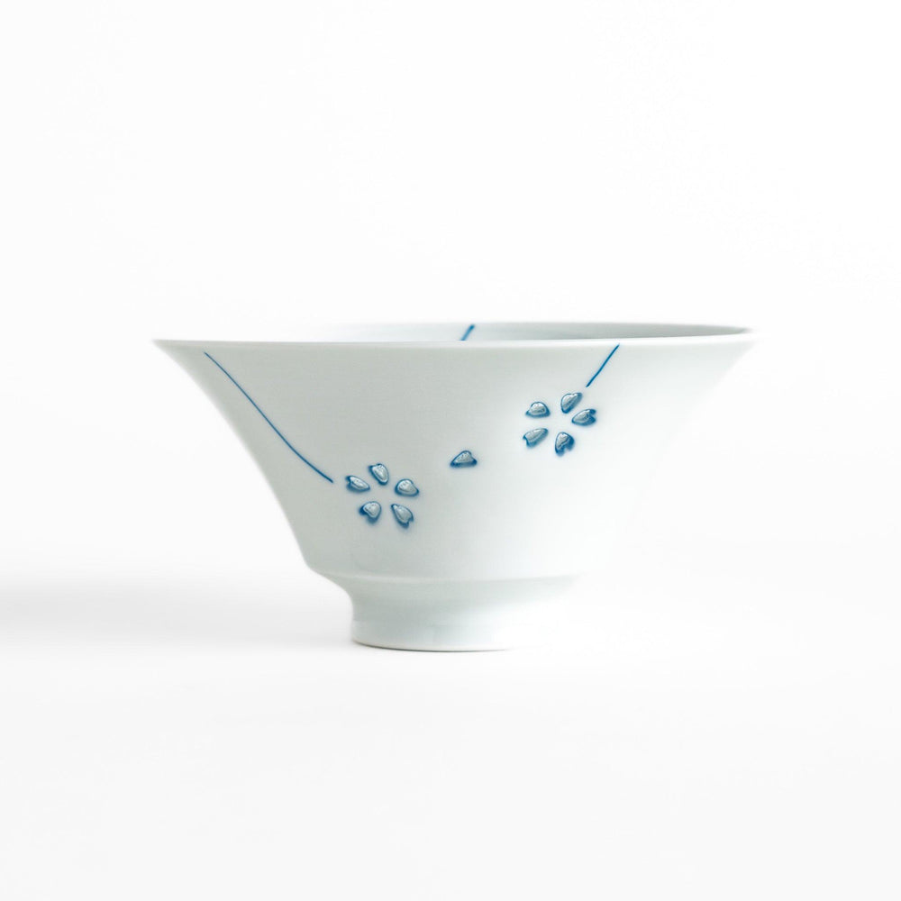 Colorful Petal Crystal Rice Bowl featuring intricate blue flower petal designs on soft white porcelain, perfect for serving rice with elegance and style.