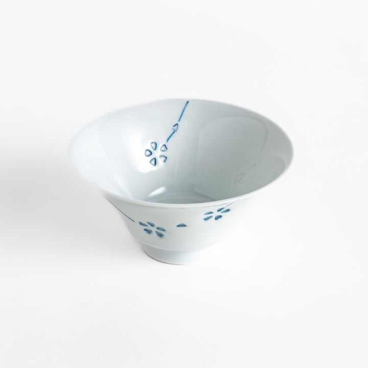Colorful Petal Crystal Rice Bowl featuring intricate blue flower petal designs on soft white porcelain, perfect for serving rice with elegance and style.