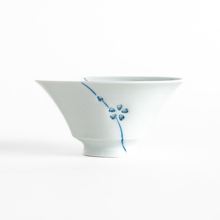 Colorful Petal Crystal Rice Bowl featuring intricate blue flower petal designs on soft white porcelain, perfect for serving rice with elegance and style.
