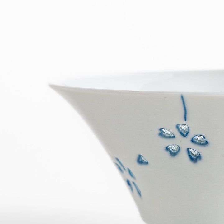 Colorful Petal Crystal Rice Bowl featuring intricate blue flower petal designs on soft white porcelain, perfect for serving rice with elegance and style.