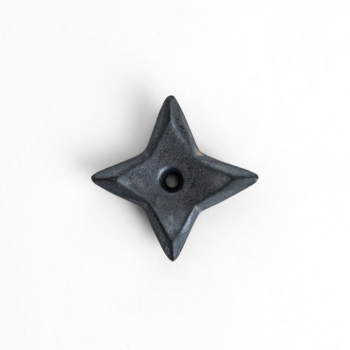 Unique ninja star-shaped chopstick rest with a sleek metallic finish, adding a playful and stylish touch to your dining experience.