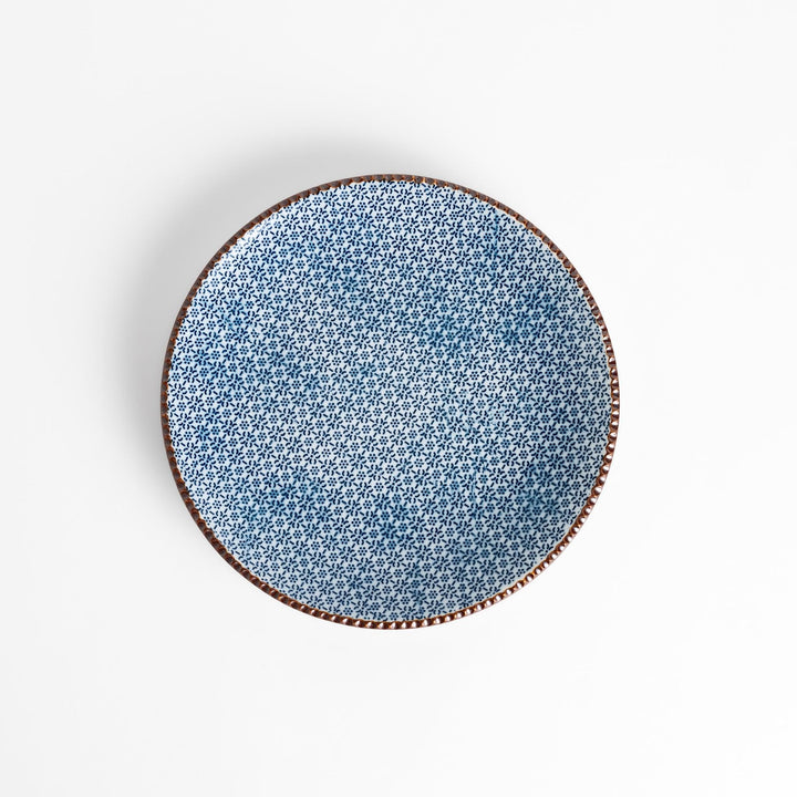 Blue and white floral patterned Salad Plate with a textured dark brown rim, ideal for serving small dishes and adding a touch of elegance to your table.