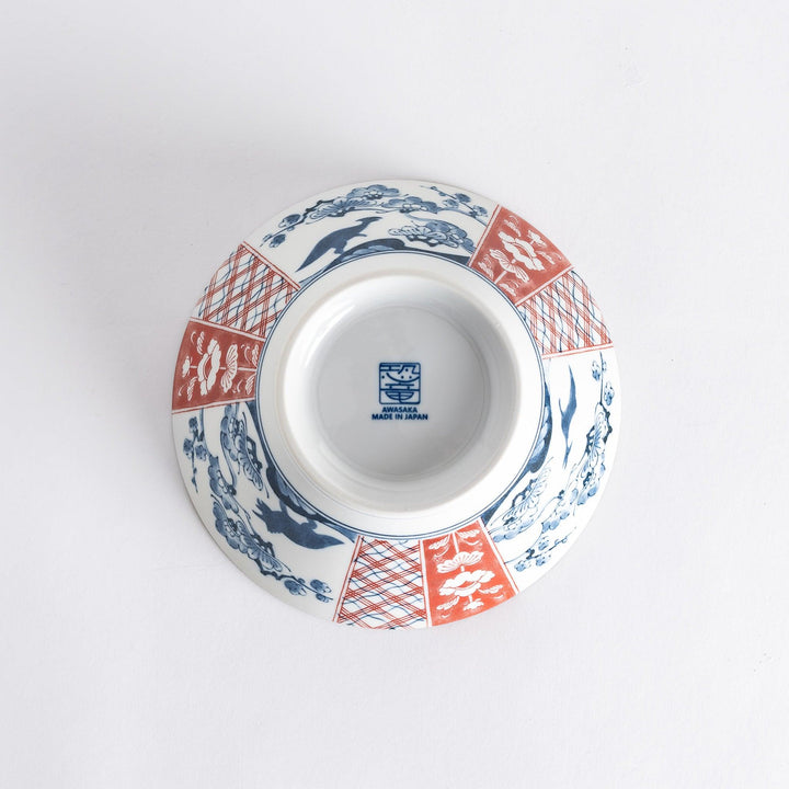 Underside view of the Edo Dinosaur Donburi bowl showing the manufacturer's mark and elegant finishing.