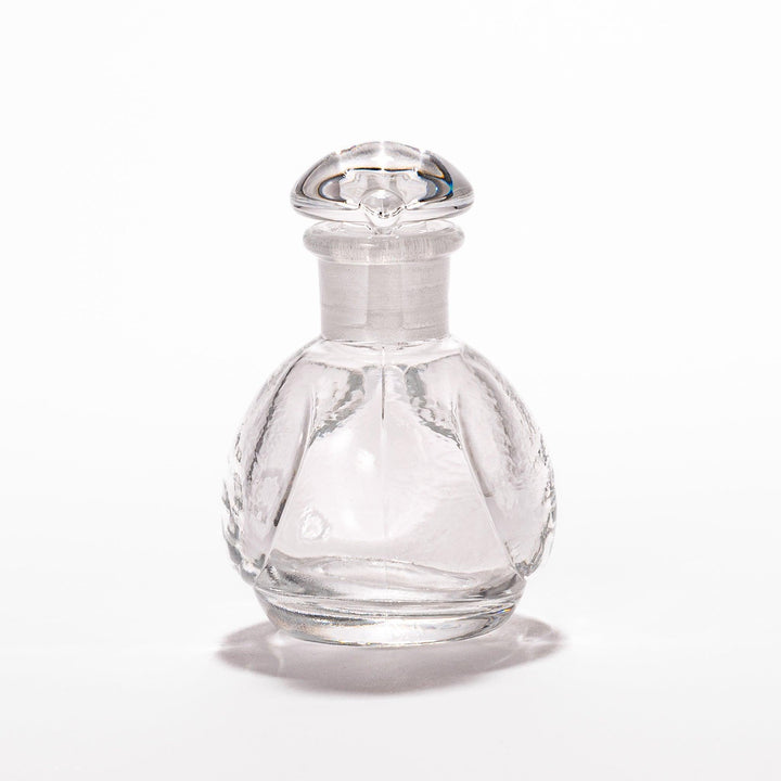 Clear glass Ethereal Songbird soy sauce dispenser with a delicate bird design, perfect for adding elegance and charm to your table setting.
