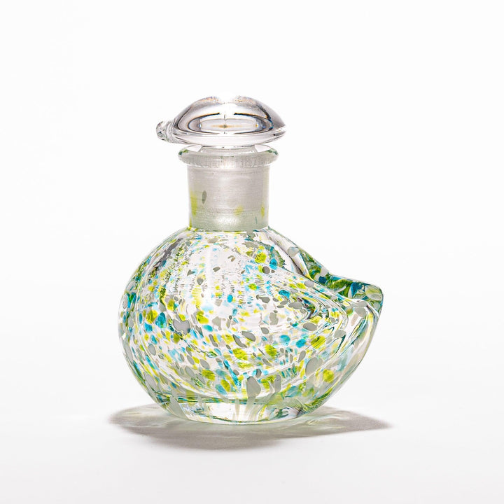 Colorful green and blue speckled Ethereal Songbird soy sauce dispenser with a delicate bird design, adding charm and elegance to your table.