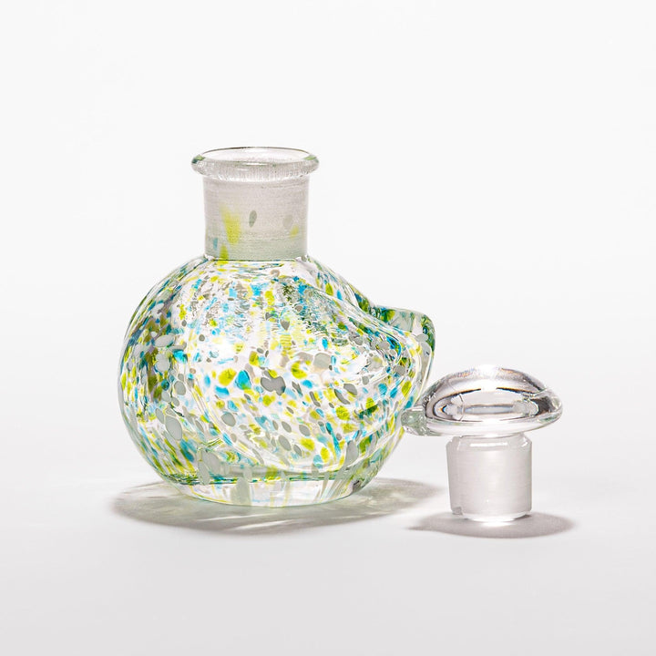 Colorful green and blue speckled Ethereal Songbird soy sauce dispenser with a delicate bird design, adding charm and elegance to your table.