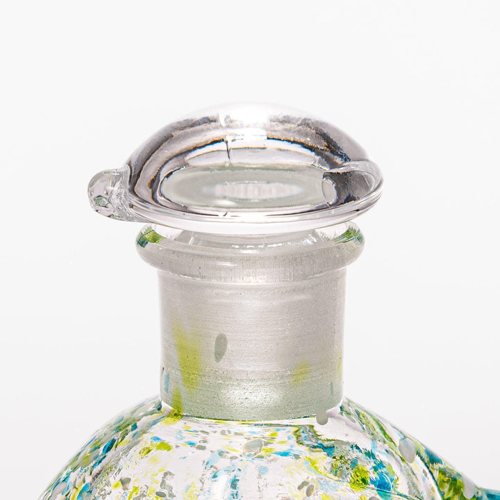 Colorful green and blue speckled Ethereal Songbird soy sauce dispenser with a delicate bird design, adding charm and elegance to your table.