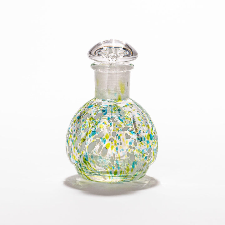 Colorful green and blue speckled Ethereal Songbird soy sauce dispenser with a delicate bird design, adding charm and elegance to your table.