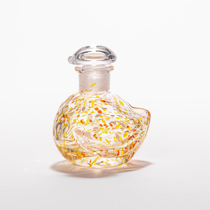Vibrant orange and yellow speckled Ethereal Songbird soy sauce dispenser with a charming bird design, perfect for adding a playful touch to your table.