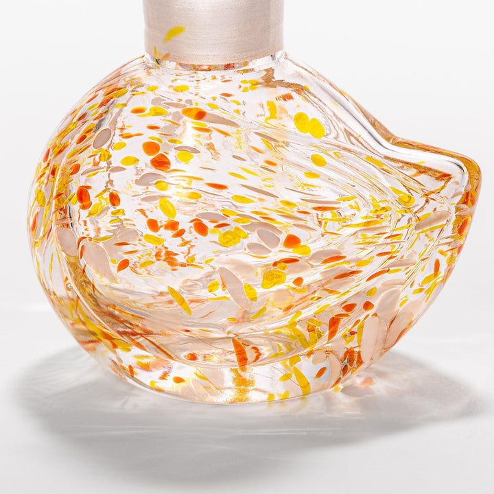 Vibrant orange and yellow speckled Ethereal Songbird soy sauce dispenser with a charming bird design, perfect for adding a playful touch to your table.