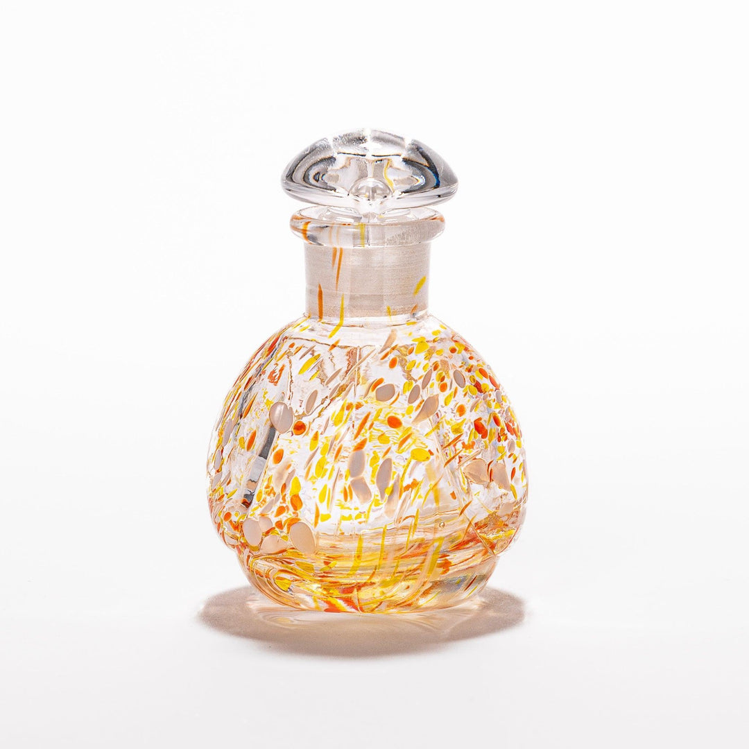 Vibrant orange and yellow speckled Ethereal Songbird soy sauce dispenser with a charming bird design, perfect for adding a playful touch to your table.