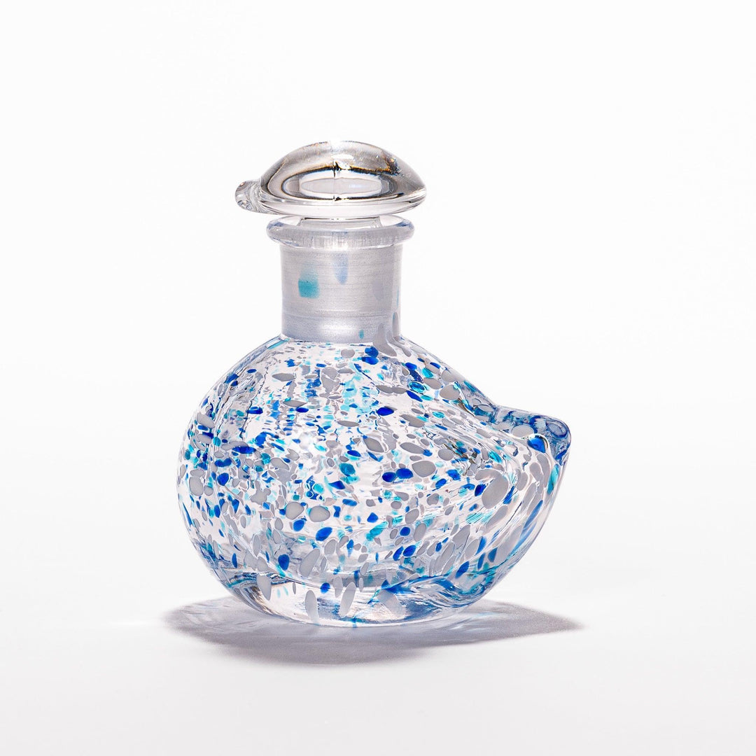 Blue and white speckled Ethereal Songbird soy sauce dispenser with a charming bird design, perfect for adding a cheerful touch to your dining experience.