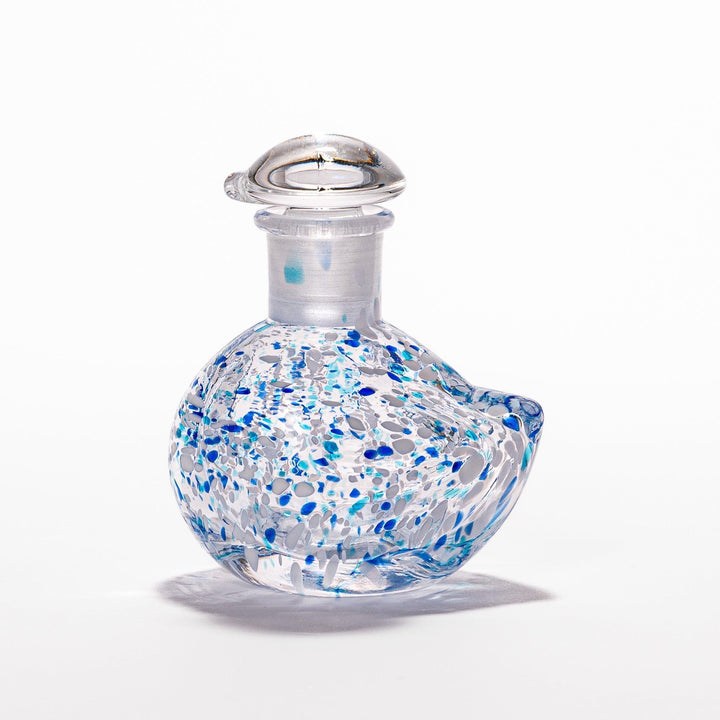 Blue and white speckled Ethereal Songbird soy sauce dispenser with a charming bird design, perfect for adding a cheerful touch to your dining experience.