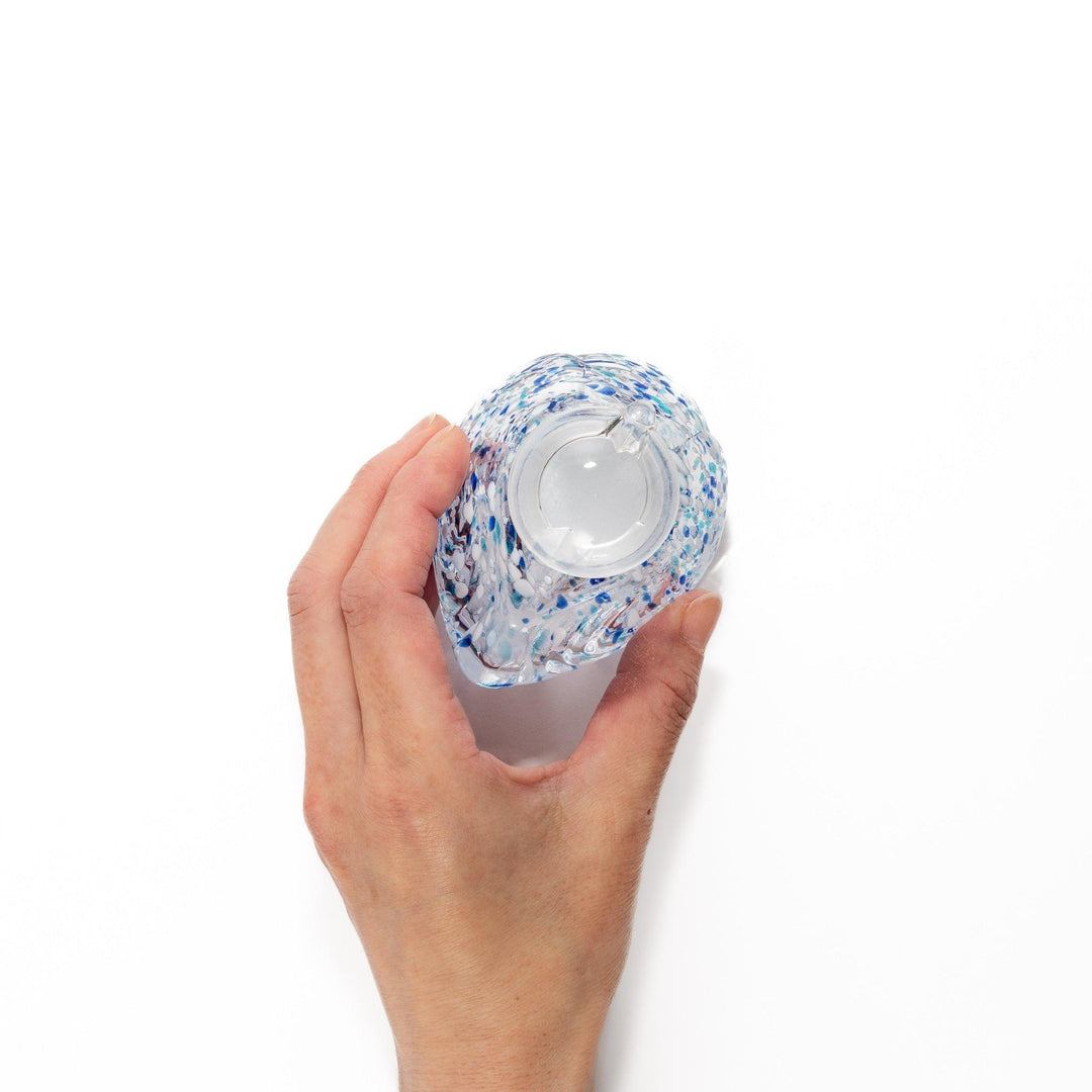 Blue and white speckled Ethereal Songbird soy sauce dispenser with a charming bird design, perfect for adding a cheerful touch to your dining experience.